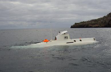 The submarine heads out to sea